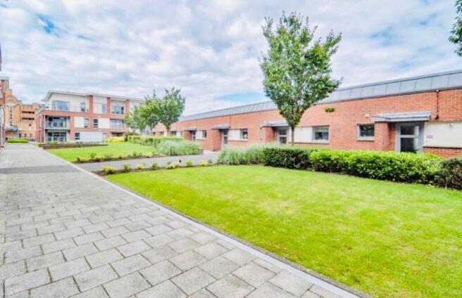 Bright and well-maintained front exterior of a ...