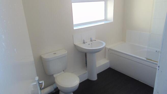 Bright and clean bathroom featuring a full bath...