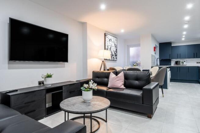 This inviting living room features modern decor...