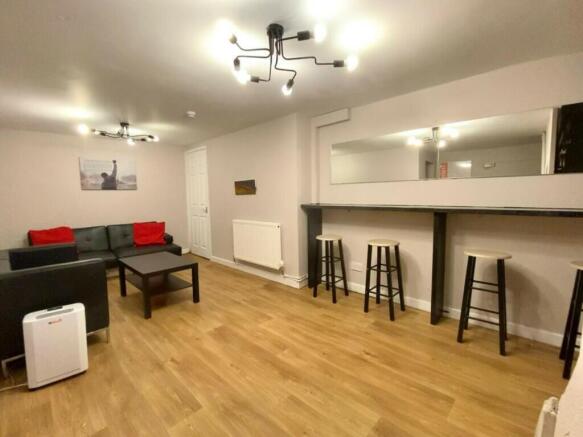 A spacious and stylish modern living room, perf...