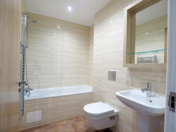 A modern, well-maintained bathroom featuring a ...