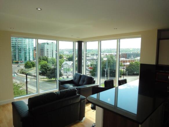 A bright and spacious large modern living room ...