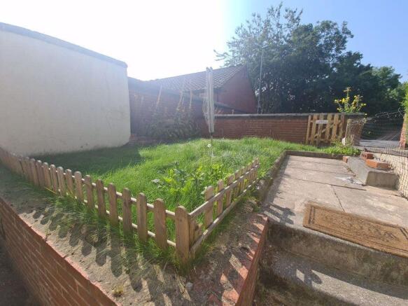 Bright and inviting garden area with a well-kep...
