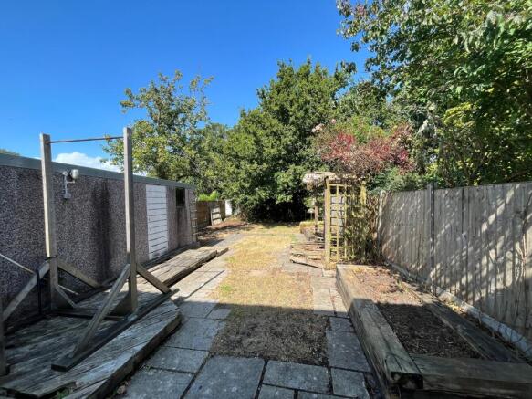 A spacious and well-lit garden area, perfect fo...