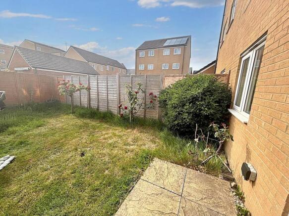 A bright and inviting garden space featuring a ...
