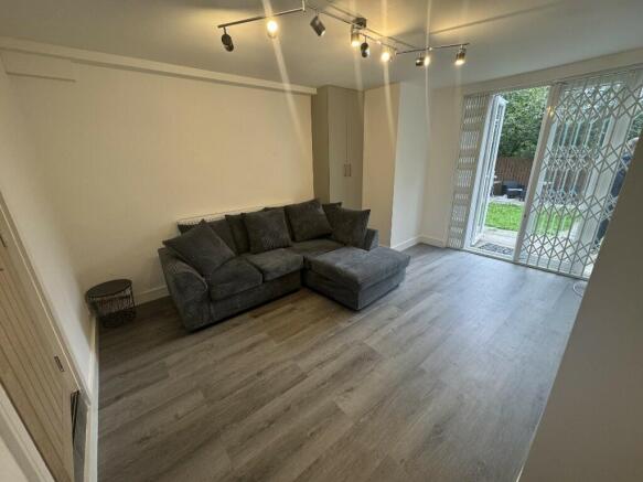 Bright and fresh living room featuring modern f...