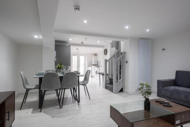 A stylish living room featuring modern furnitur...