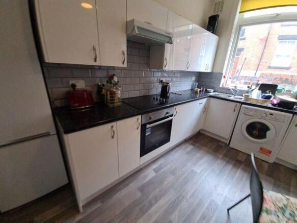 Bright and modern kitchen with ample countertop...