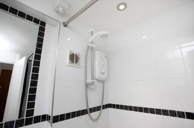 A modern and clean bathroom featuring a stylish...