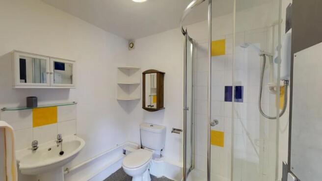Bright and clean bathroom featuring a modern co...