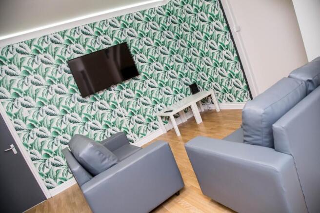 A stylish living room featuring modern furnishi...