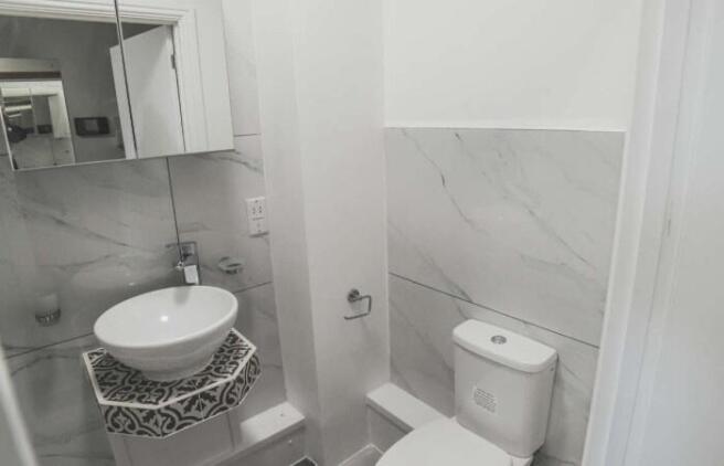 A modern and clean single toilet featuring styl...
