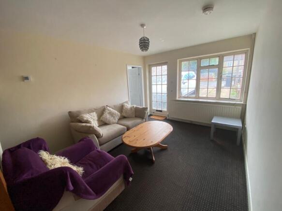 A cozy living room featuring comfortable seatin...