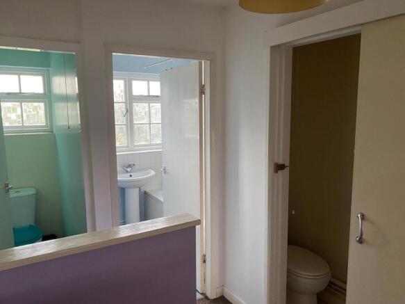 A bright and tidy bathroom with good natural li...