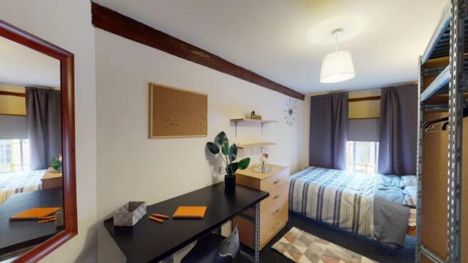 A bright and inviting double bedroom, perfect f...