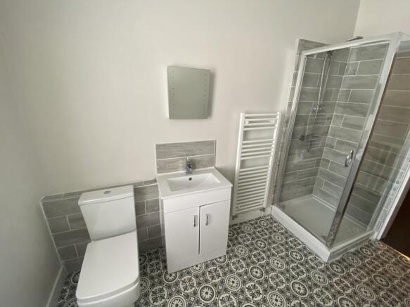 This modern bathroom features a sleek design wi...