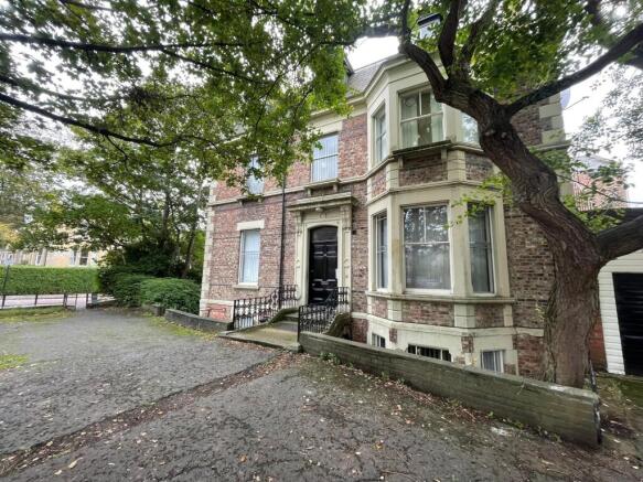 Exterior view of a charming, traditional brick ...