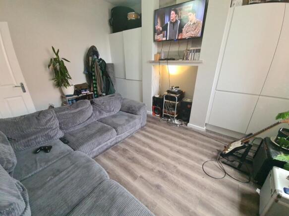 Cozy and modern living room featuring a comfort...