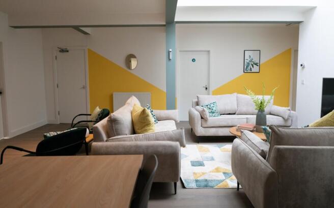 A spacious and stylish modern living room, perf...