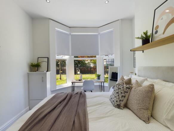 A bright and spacious large double bedroom feat...