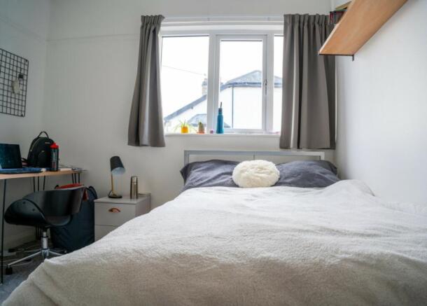 A bright and inviting double bedroom perfect fo...