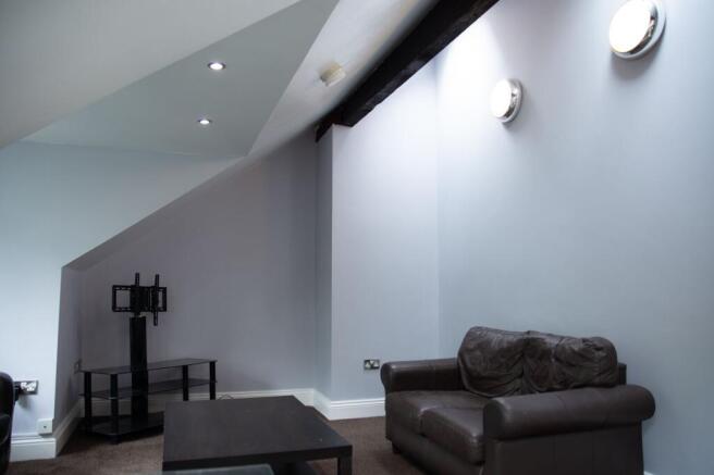 Contemporary living room with a comfortable lea...
