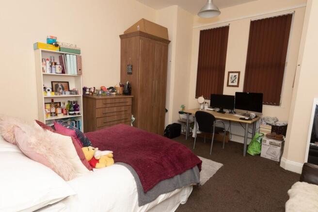 Spacious and welcoming living area featuring a ...