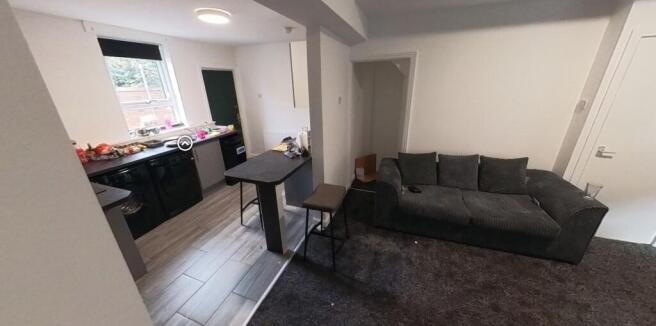 A modern living room with ample natural light, ...