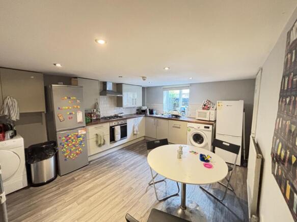 Modern and well-organized kitchen with efficien...