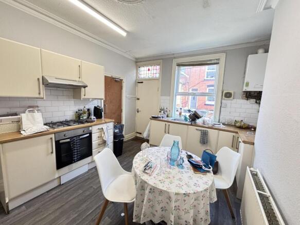 Bright and welcoming living room with large win...