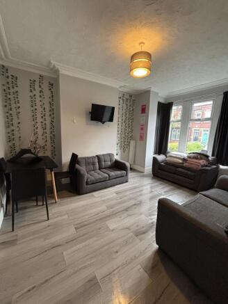 Bright and welcoming living room with comfortab...