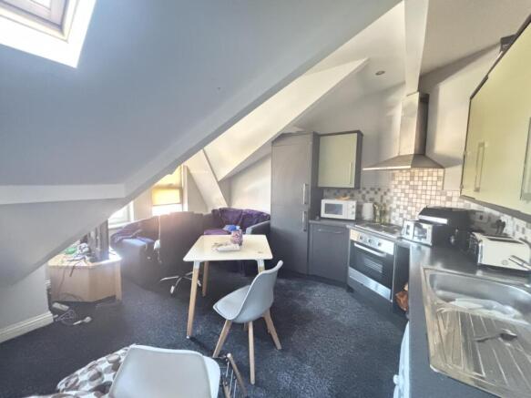 Bright and inviting living area with natural li...