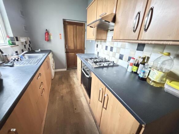 A well-maintained kitchen with ample countertop...