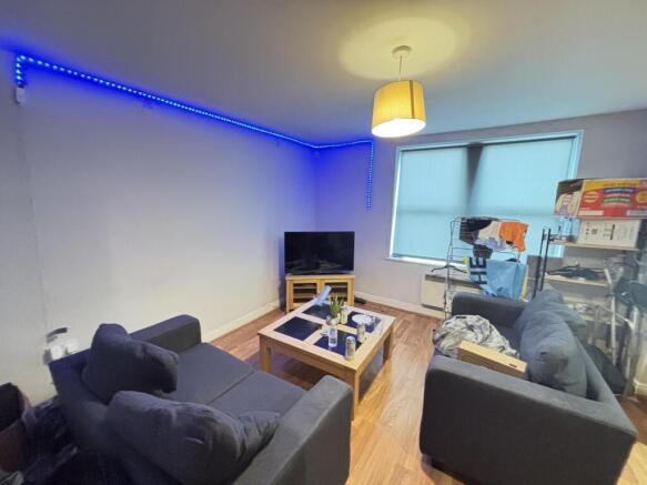 A modern and cozy living room with comfortable ...