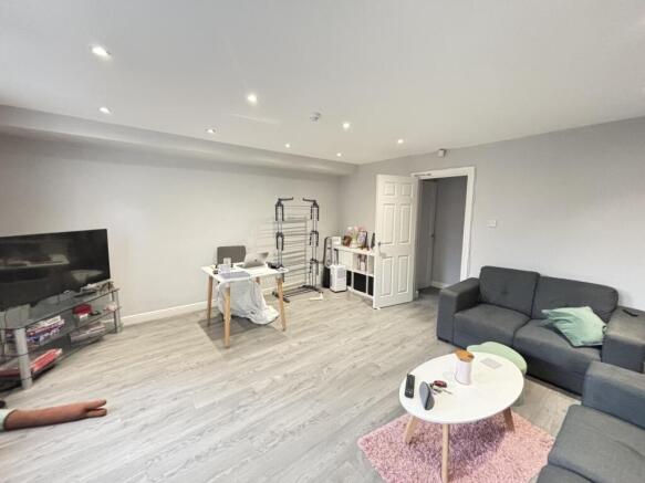 Bright and spacious living room with modern fur...