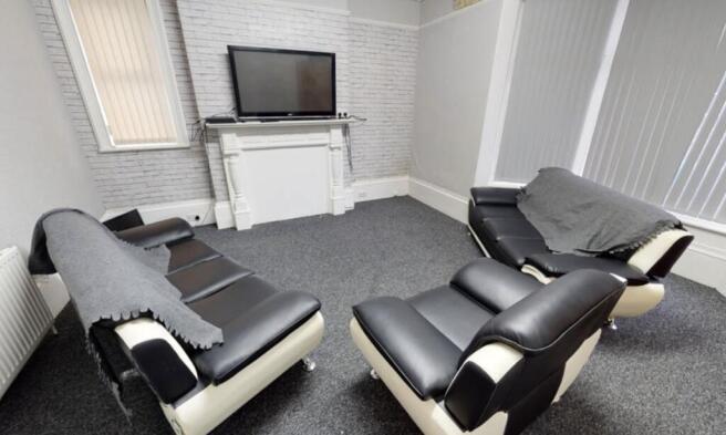 Modern and well-maintained living room with com...