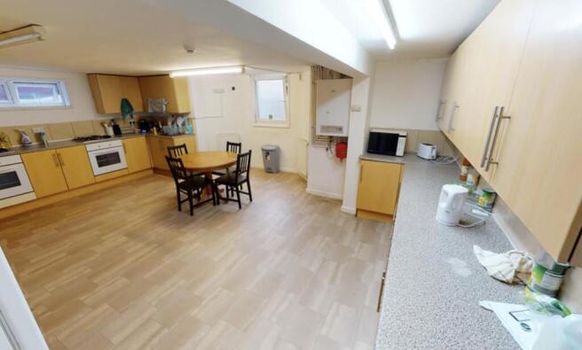 A bright and spacious living area with modern d...