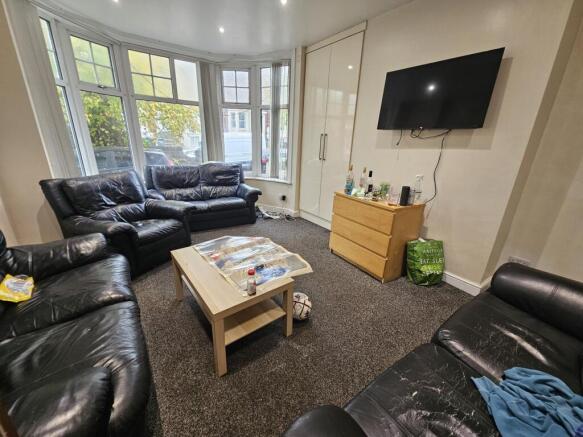 A spacious and inviting living room featuring c...