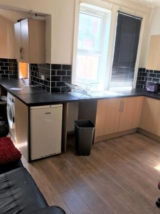 A modern, well-maintained kitchen area featurin...