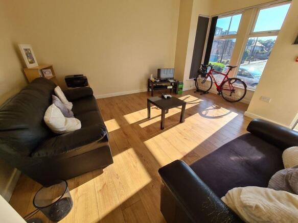 Bright and welcoming living room featuring two ...