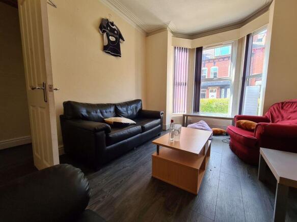 A welcoming and well-maintained living room wit...