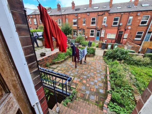 A pleasant, well-maintained garden area with a ...