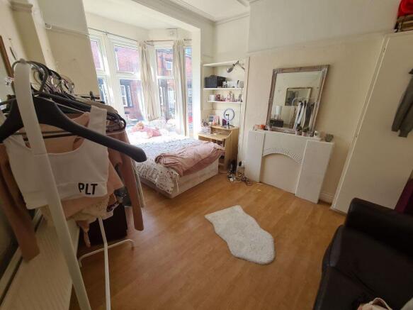 Bright and inviting master bedroom featuring a ...