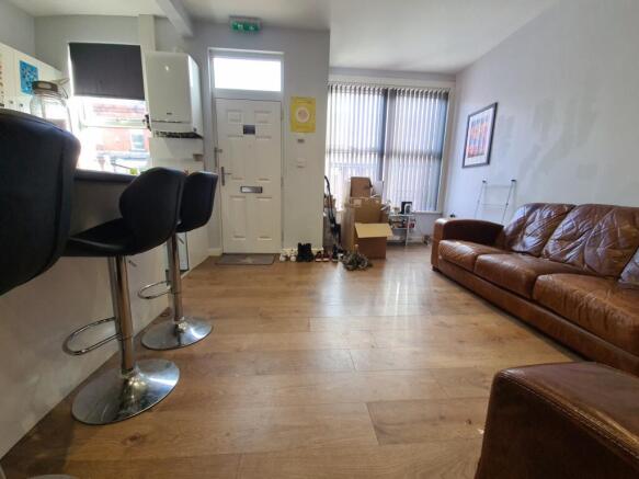 Bright and welcoming living room featuring mode...