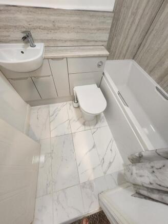 A modern, well-maintained bathroom featuring a ...