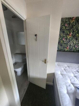 A clean and well-maintained bathroom featuring ...