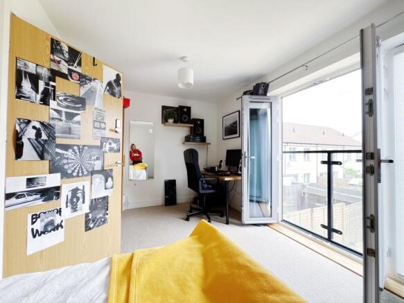 Bright and welcoming living room with large win...