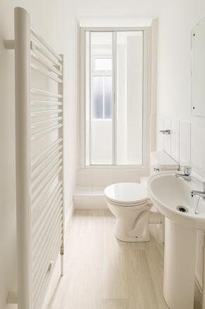 Bright and clean bathroom with modern fixtures,...