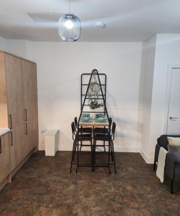 Modern and tidy living room with good natural l...