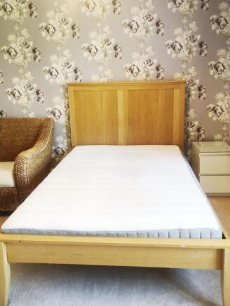 Bright, neatly presented double bedroom with a ...